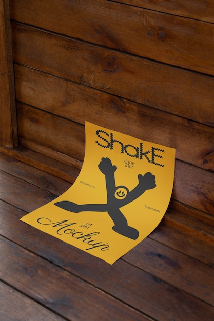 Une maquette d'affiche glissant sur le mur