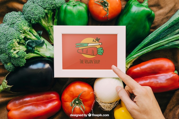 Maquette de cadre avec des dessins de légumes