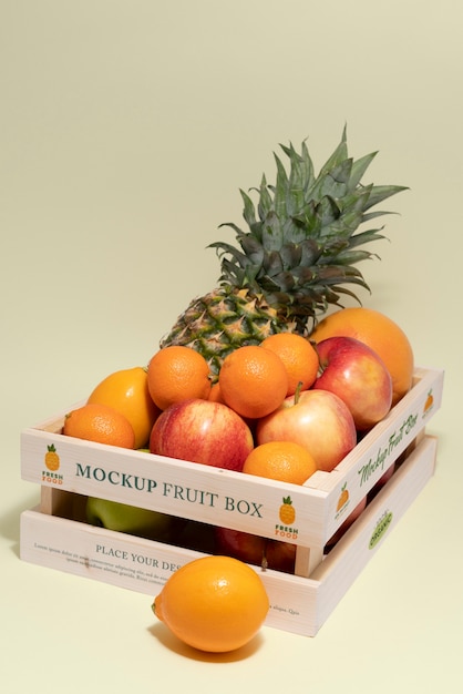 PSD maquette de caisse en bois avec fruits exotiques