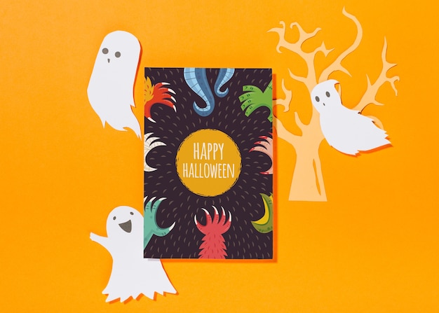 PSD maquette de couverture d'halloween avec des fantômes de papier