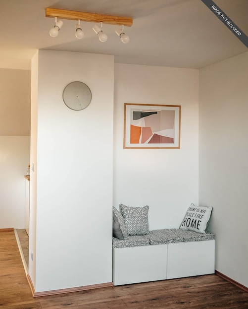 PSD maquette de galerie de design d'intérieur avec coussin et mur blanc