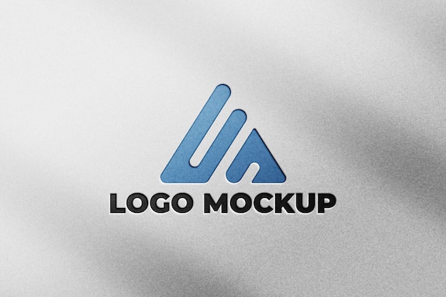 Maquette de logo bleu en creux sur papier blanc