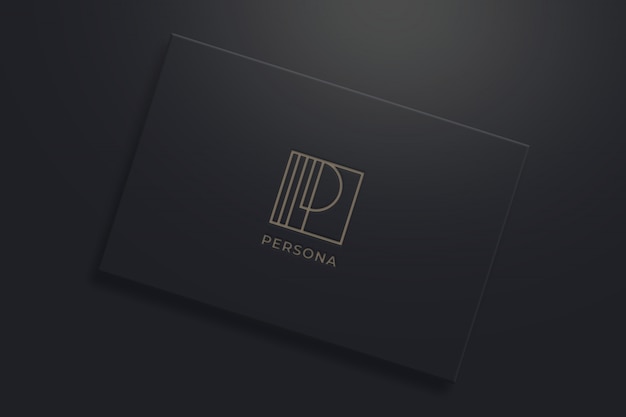 Maquette de logo minimaliste sur carte de visite noire
