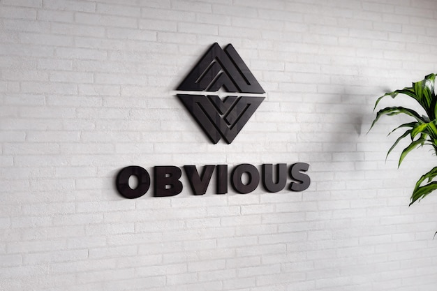 Maquette de logo sur un mur de briques blanches texturées