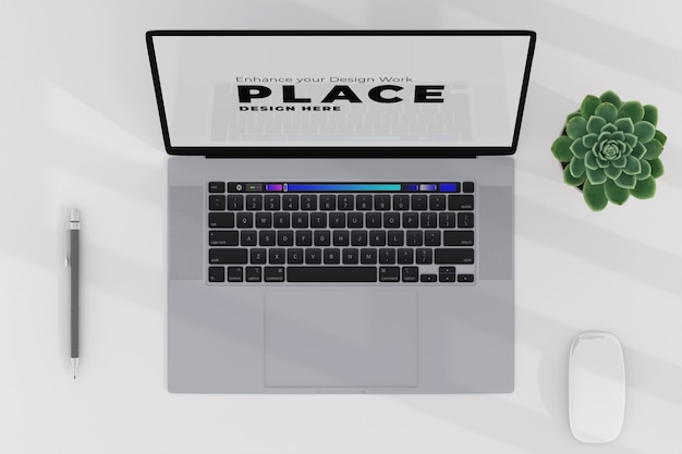 PSD maquette d'ordinateur portable avec cactus botanique et souris