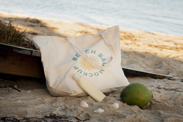 PSD maquette de sac de plage sur le sable