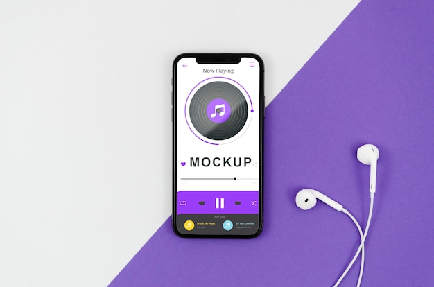Maquette de smartphone à plat avec écouteurs