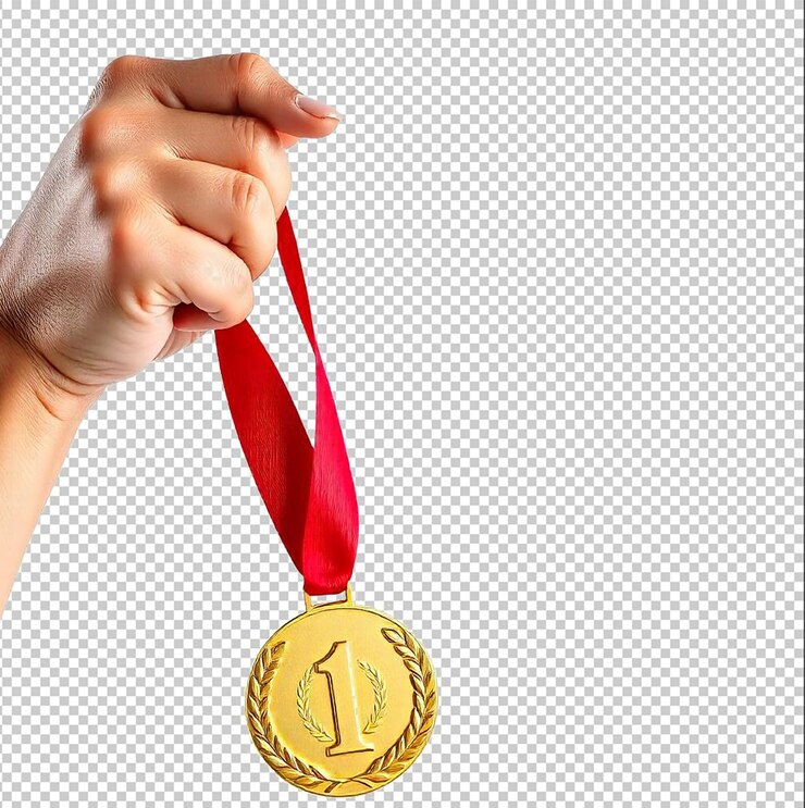 una medalla de oro con una cinta roja en ella