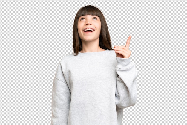 Menina sobre isolado verde chroma chave fundo apontando para cima e surpreendido