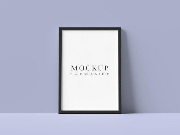 Minimaler schwarzer Rahmen-Mockup auf weichem blauen Hintergrund Vertikaler Poster-Display