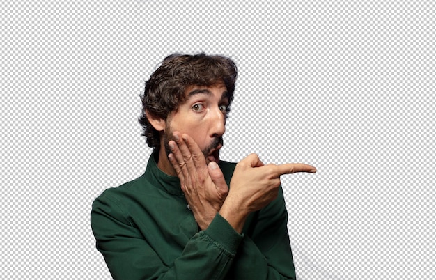 mit einem schockierten Gesichtsausdruck überrascht und auf die Seite zeigte