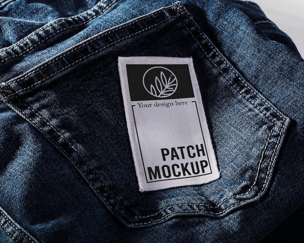 Mock-up di patch per abbigliamento in tessuto su denim