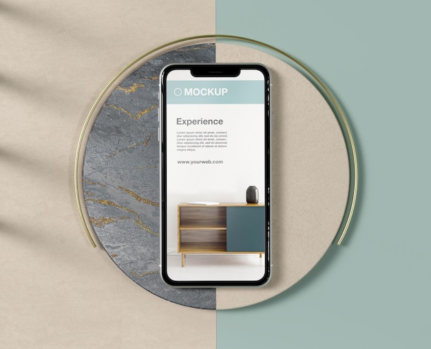 Mock-up di smartphone con elementi in pietra ed elementi metallici