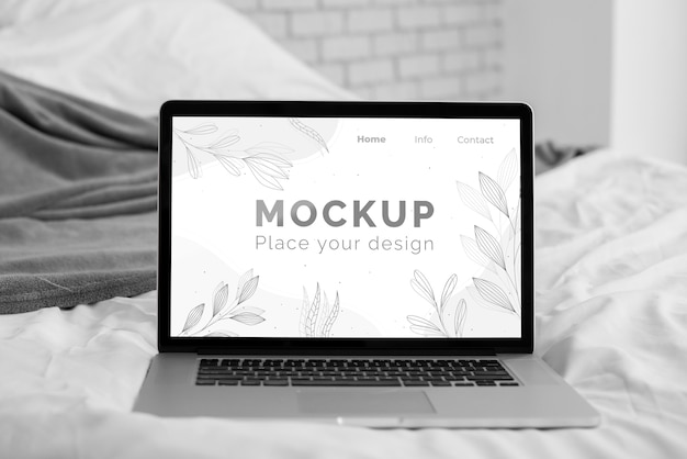Mock up Laptop im Schlafzimmer