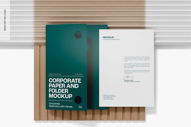 Mockup de carpeta y papel corporativo, vista superior