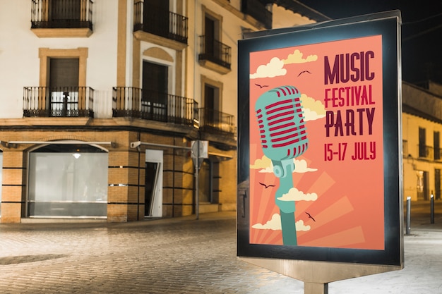 Mockup de cartel en ciudad de noche