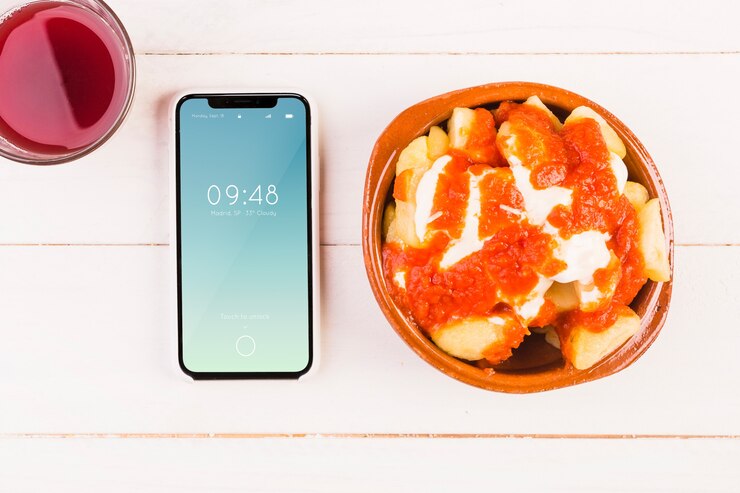 PSD mockup de comida típica española con smartphone