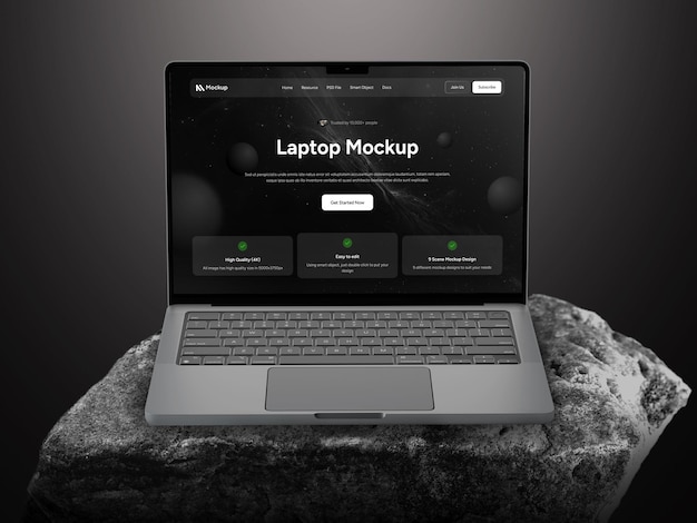 Mockup de una computadora portátil en una piedra