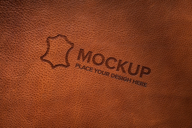 Mockup con logo in pelle drammatica luce calda