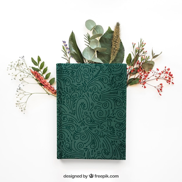 PSD mockup con concepto de primavera con libro en hojas