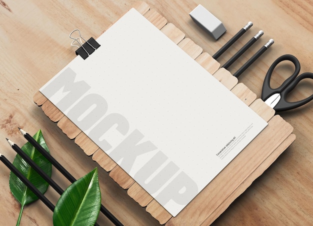 Mockup de folheto A4 mínimo limpo com folhas e lápis para apresentação