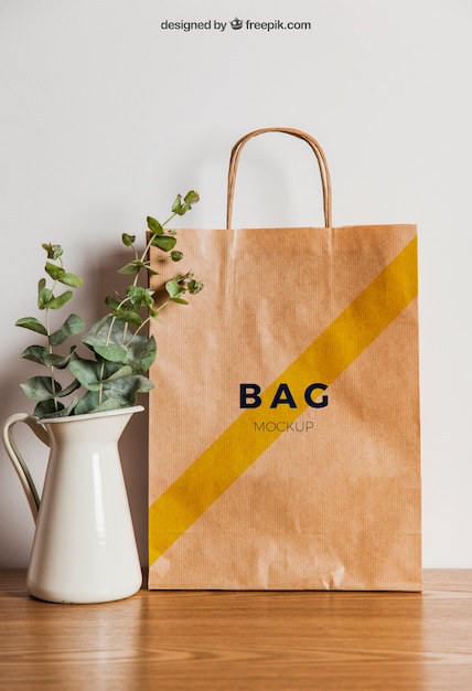 Mockup de papel e pote de flores