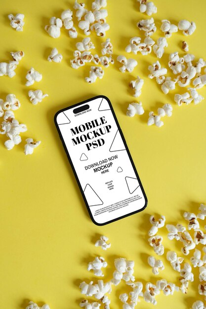 Mockup de smartphone com pipoca em fundo amarelo