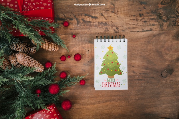 Mockup decorativo de navidad con libreta