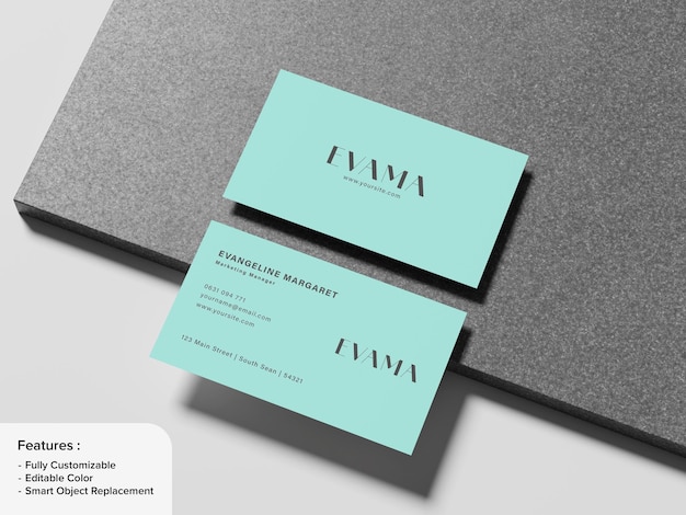Mockup di biglietto da visita con articoli di cancelleria in teal