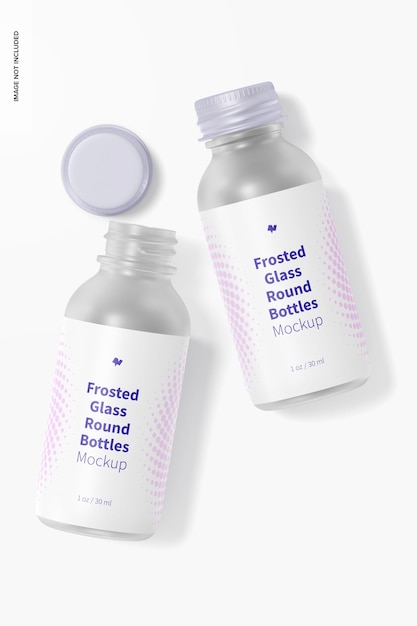 Mockup di bottiglie rotonde in vetro smerigliato da 1 oz, vista dall'alto