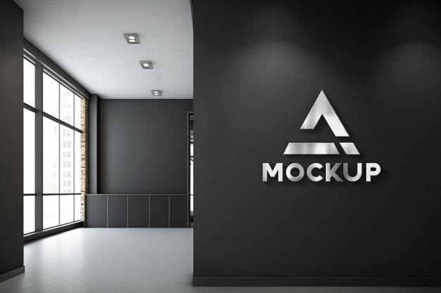 Mockup di branding del logo PSD 3d nello spazio riunioni dell'ufficio con tavolo e laptop