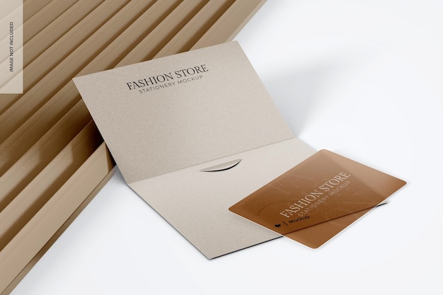 Mockup di carta regalo del negozio di moda appoggiato