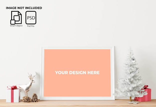 Mockup di cornice con decorazioni natalizie e regali