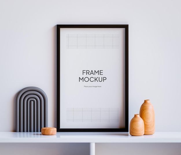 Mockup di cornice per foto PSD sul tavolo con parete bianca del soggiorno con decorazione estetica e in legno