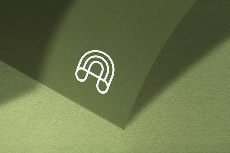 PSD mockup di logo su texture di carta verde