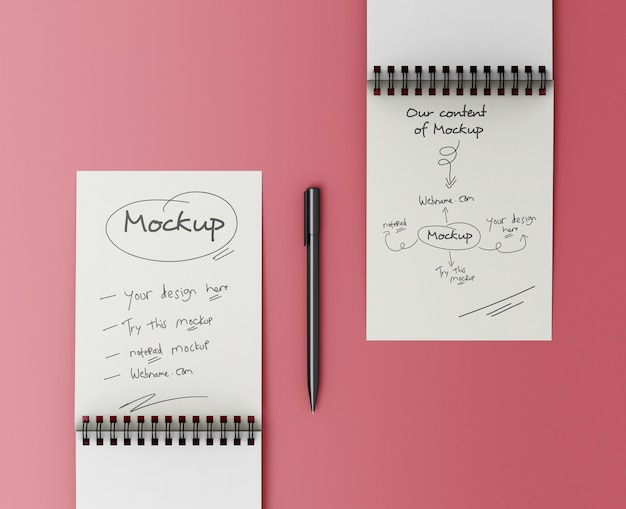 Mockup di quaderni con una penna
