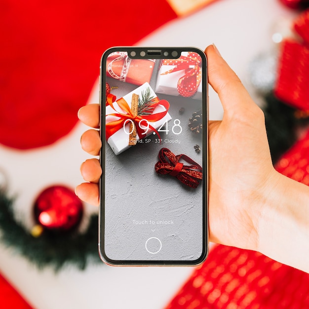 Mockup di smartphone con il concetto di Natale