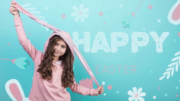 PSD mockup feliz día de pascua con una niña