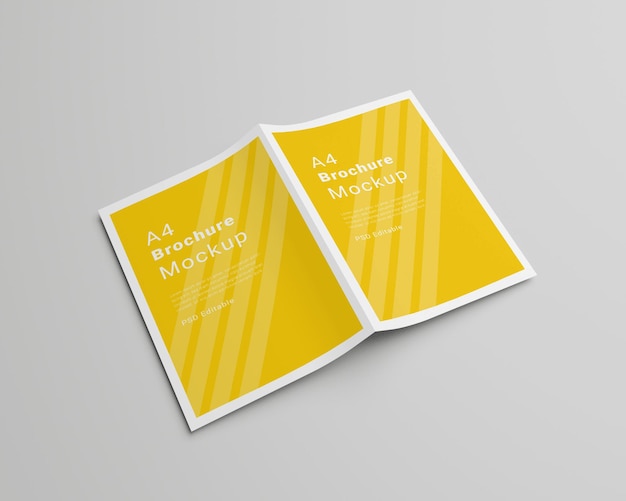 Mockup de folleto A4 abierto con diseño de portada amarilla