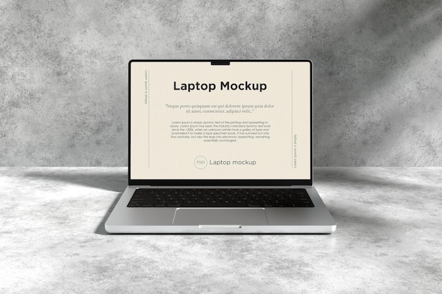 Mockup de laptop con fondo de cemento