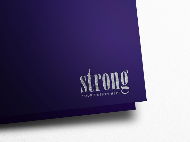 PSD mockup logo di lusso in lamina d'argento su carta artigianale nera