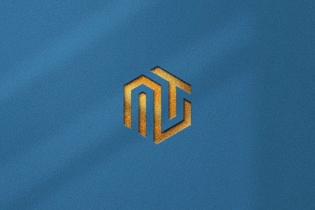 Mockup logo oro effetto impresso su sfondo texture