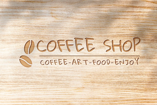 Mockup del logotipo de Deboss psd para café sobre fondo de textura de madera