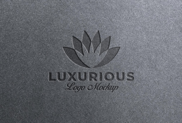 Mockup de logotipo grabado en papel gris