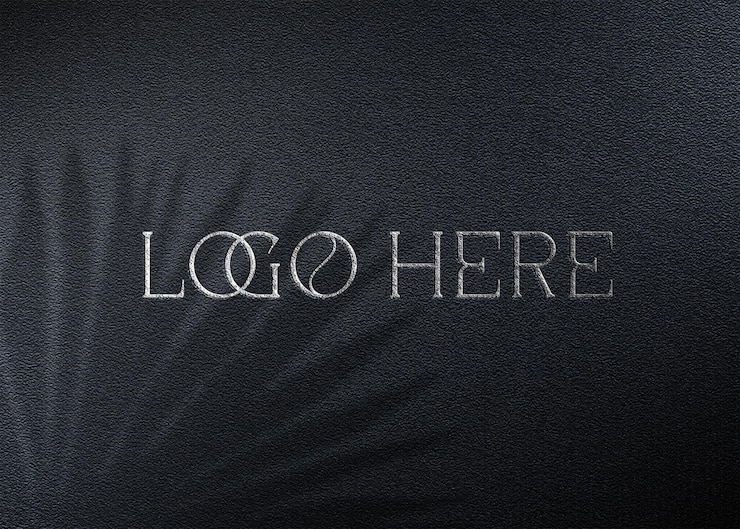 PSD mockup del logotipo plateado de la pared