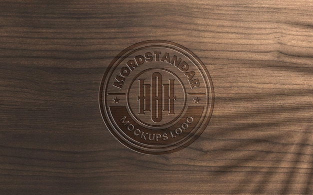 PSD mockup de logotipo en relieve en madera