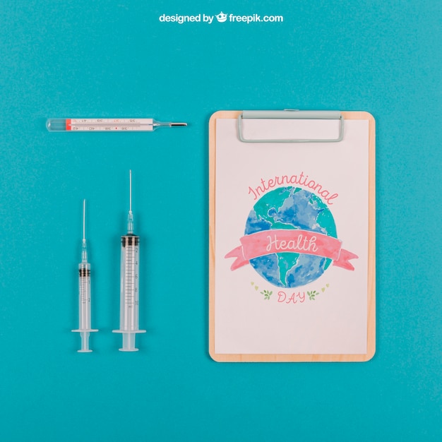 PSD mockup médico con agujas y portapapeles