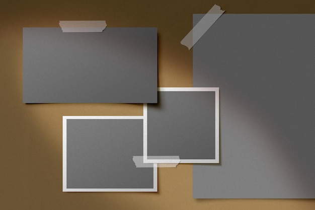 Mockup of photo frames with tape on a textured surface