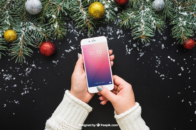 Mockup de pantalla de smartphone con diseño de navidad