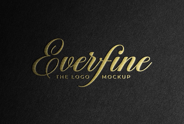 Mockup de papel negro con efecto de lámina de oro para el logotipo